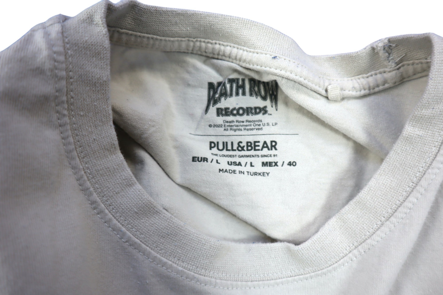 Béžové tričko s potiskem