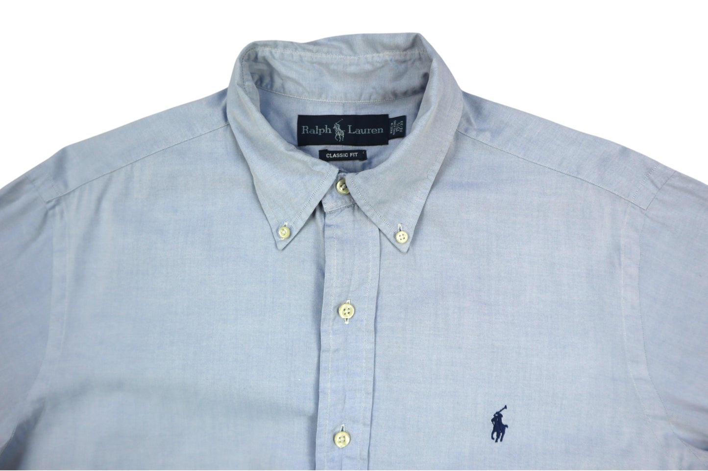 Světle modrá košile