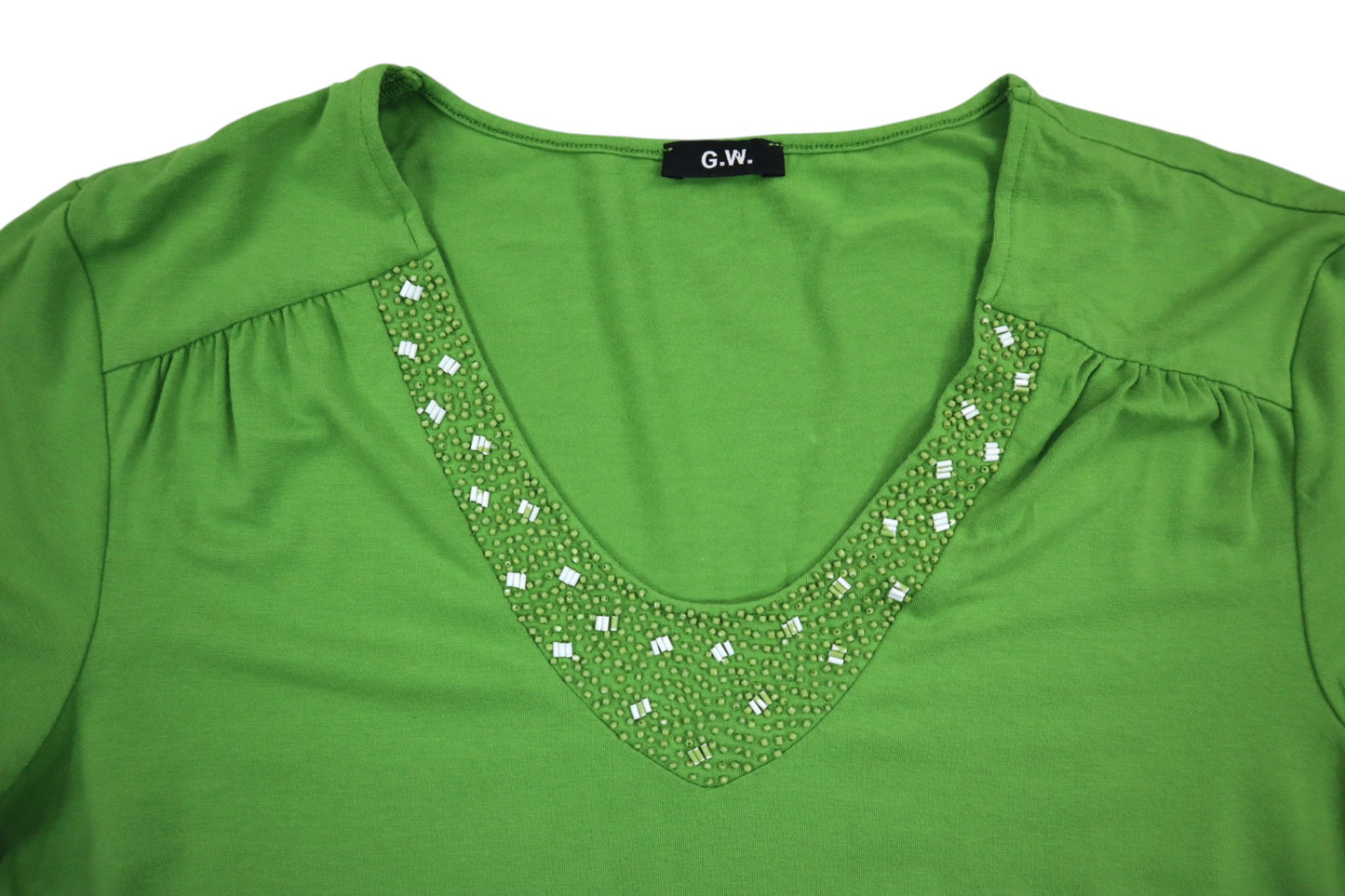 Zelené tričko s kamínky