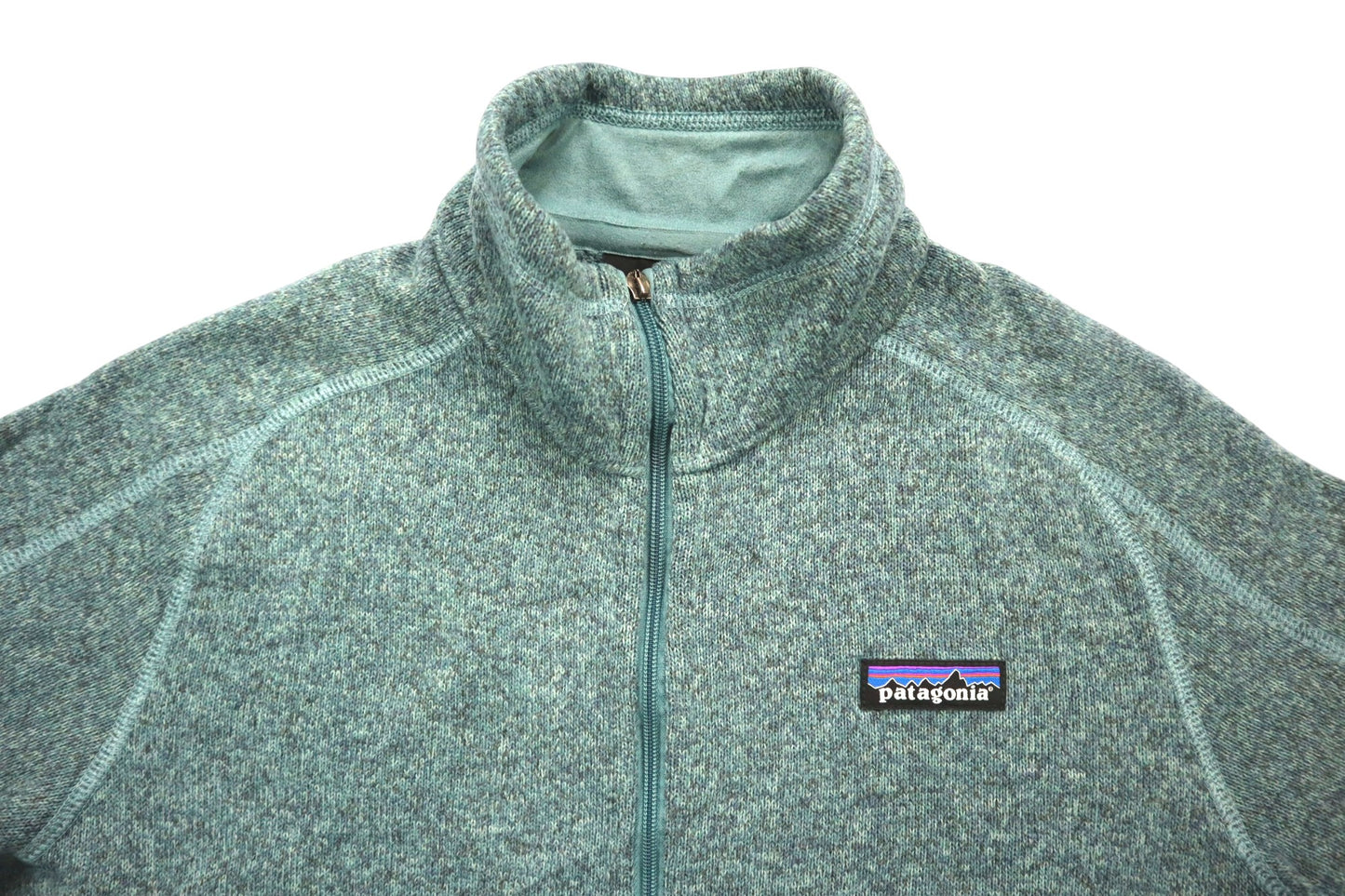 Tmavší tyrkysová mikina