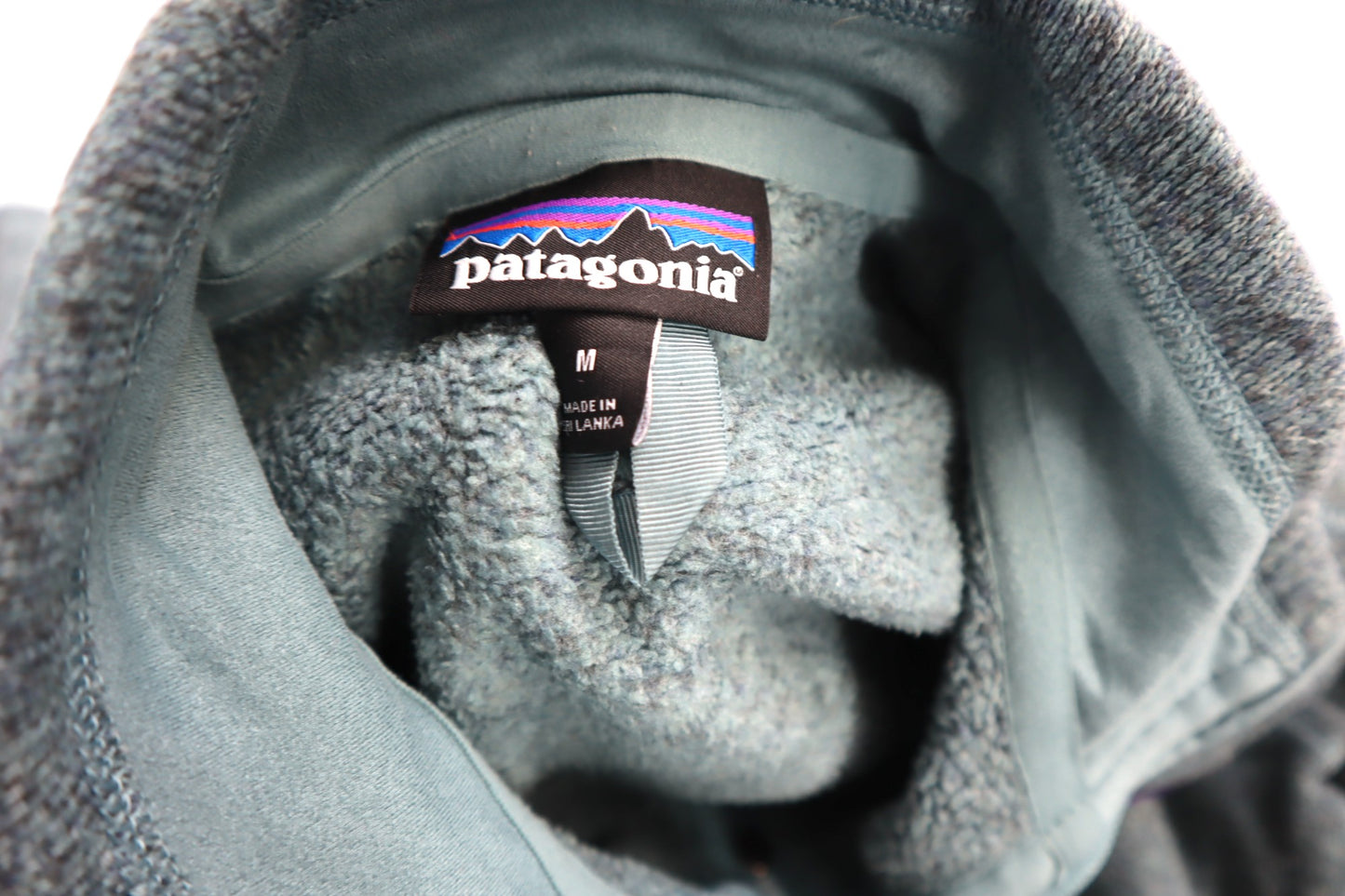 Tmavší tyrkysová mikina