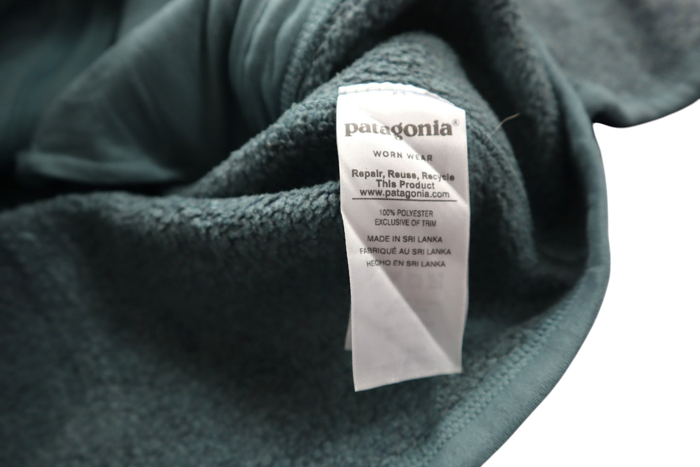 Tmavší tyrkysová mikina